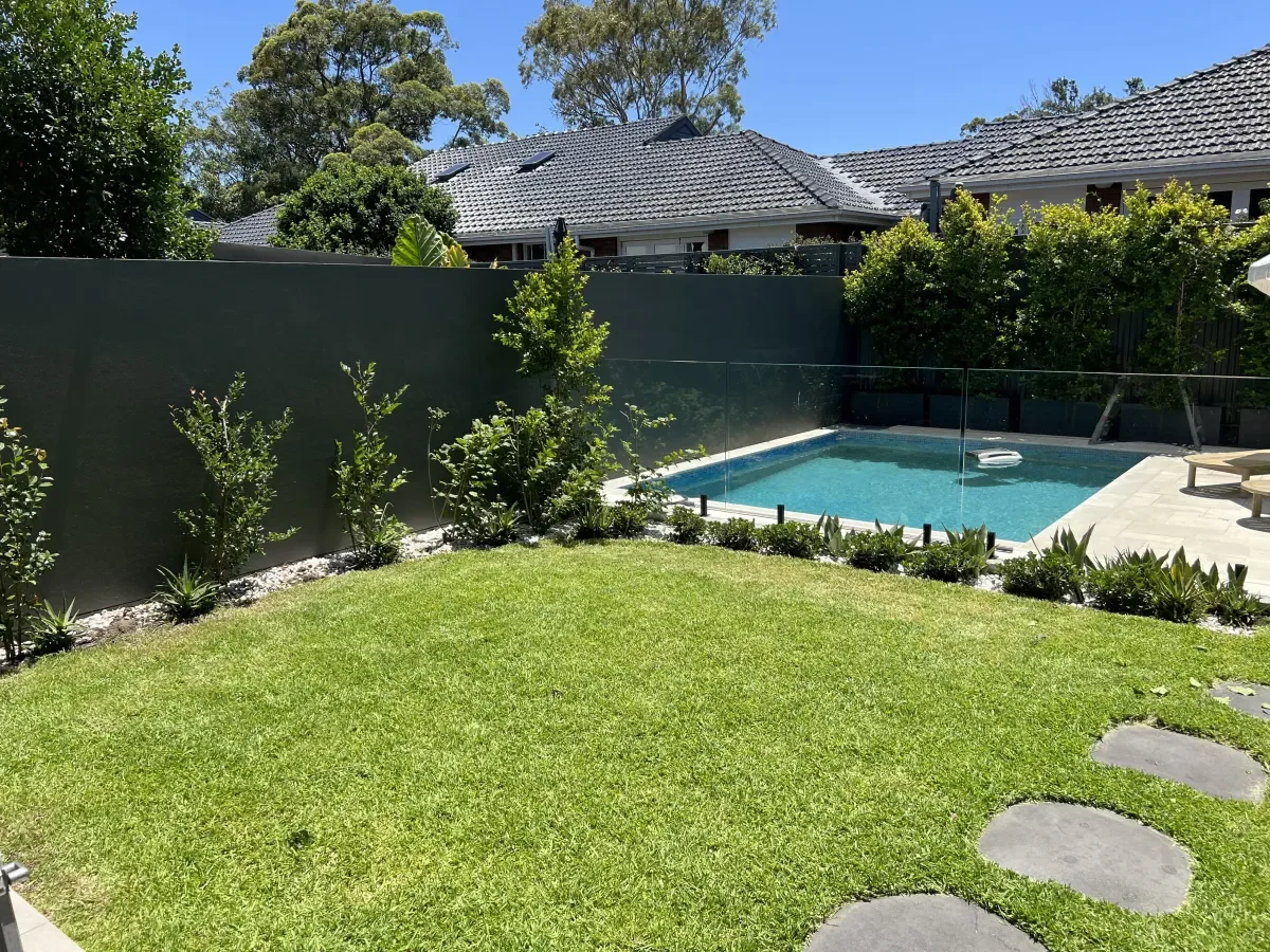 A lush lawn and well kept residential garden cared for by SNS Facility Services